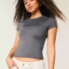 Weiches, nahtloses Longline-Baby-T-Shirt aus elastischem Stoff Weiches, nahtloses Longline-Baby-T-Shirt aus elastischem Stoff
