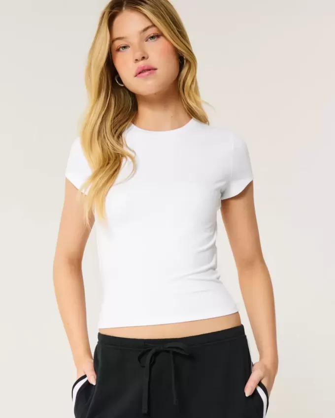 Weiches, nahtloses Longline-Baby-T-Shirt aus elastischem Stoff