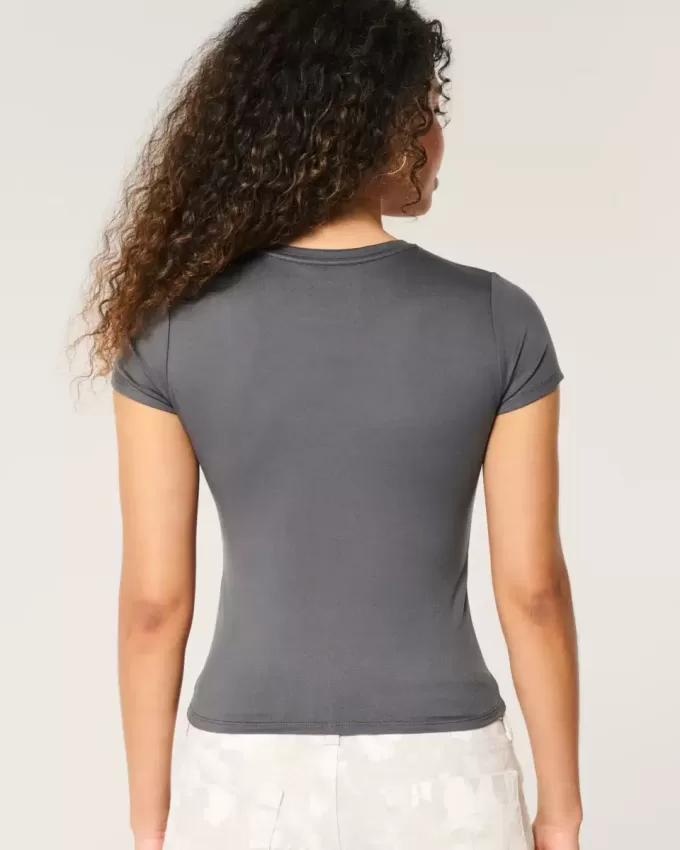 Weiches, nahtloses Longline-Baby-T-Shirt aus elastischem Stoff Weiches, nahtloses Longline-Baby-T-Shirt aus elastischem Stoff