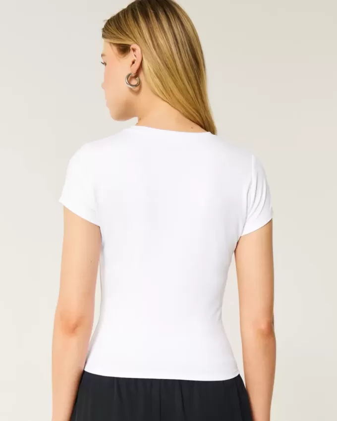 Weiches, nahtloses Longline-Baby-T-Shirt aus elastischem Stoff