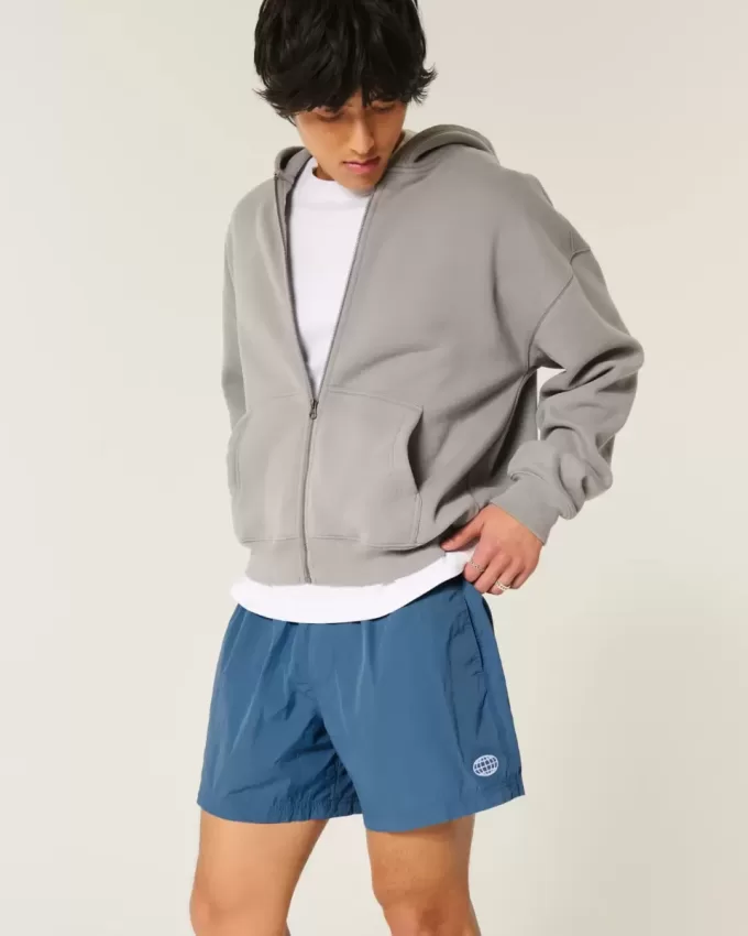 Baggy-Fußballshorts bis zur Mitte des Oberschenkels Baggy-Fußballshorts bis zur Mitte des Oberschenkels