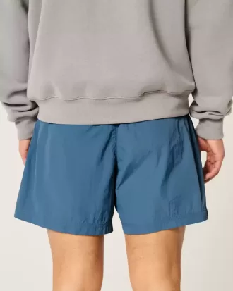 Baggy-Fußballshorts bis zur Mitte des Oberschenkels