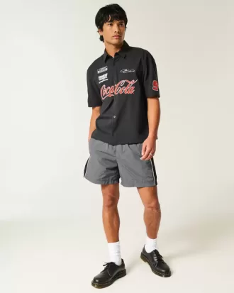 Baggy-Fußballshorts bis zur Mitte des Oberschenkels