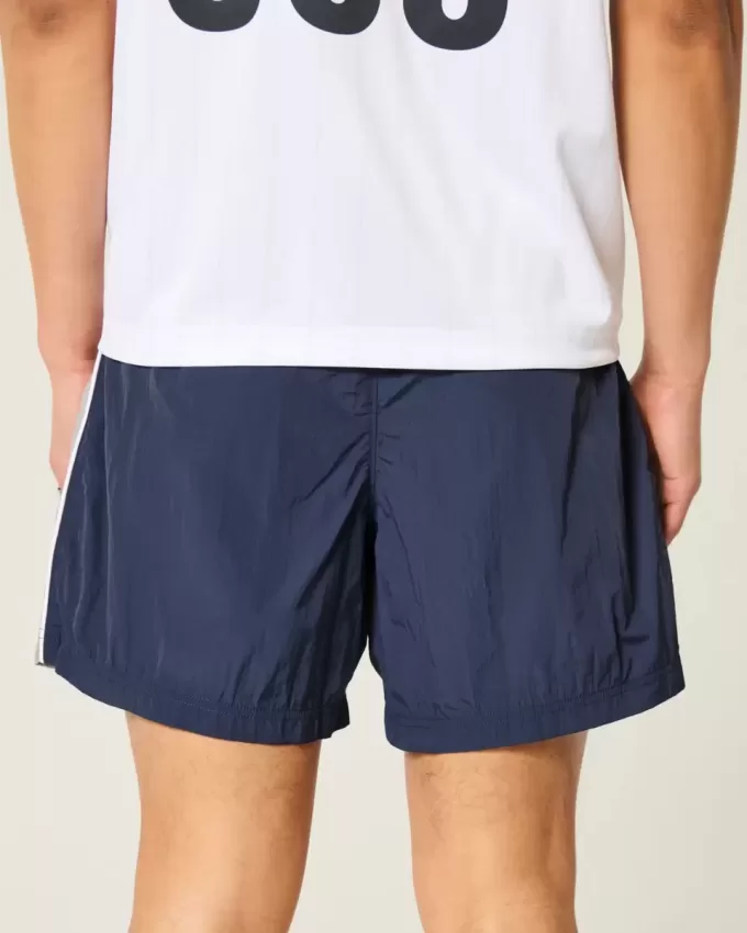 Baggy-Fußballshorts bis zur Mitte des Oberschenkels