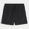 Baggy-Fußballshorts bis zur Mitte des Oberschenkels