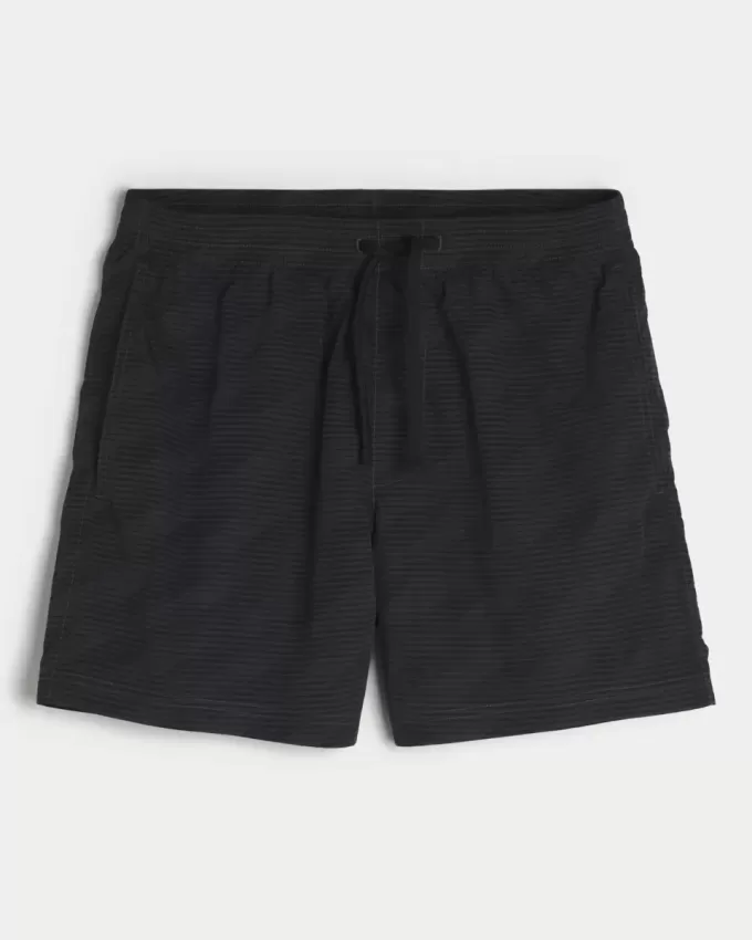 Baggy-Fußballshorts bis zur Mitte des Oberschenkels