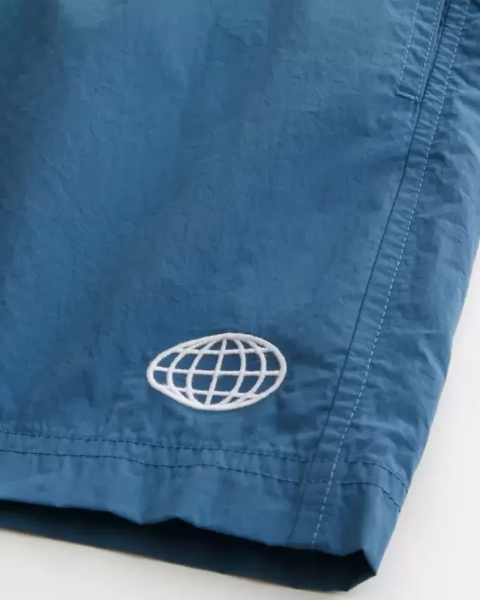 Baggy-Fußballshorts bis zur Mitte des Oberschenkels Baggy-Fußballshorts bis zur Mitte des Oberschenkels