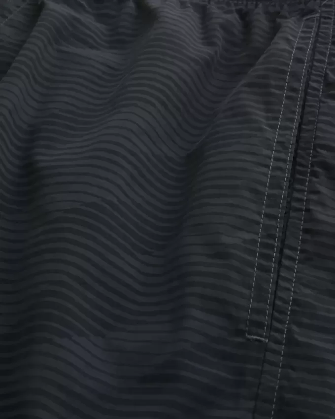 Baggy-Fußballshorts bis zur Mitte des Oberschenkels