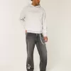 Baggy-Jeans in verwaschenem Schwarz mit Stern-Grafik
