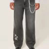 Baggy-Jeans in verwaschenem Schwarz mit Stern-Grafik