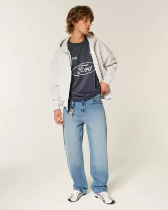 Baggy-Jeans mit Adler-Grafik in mittlerer Waschung