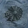 Baggy-Jeans mit Doodle-Muster in mittlerer Waschung