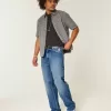 Baggy-Jeans mit dunkler Waschung und Rose-Grafik