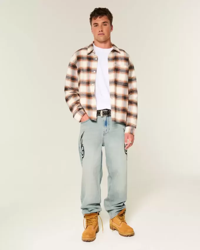 Baggy-Jeans mit Grafik in heller Waschung