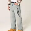 Baggy-Jeans mit Grafik in heller Waschung