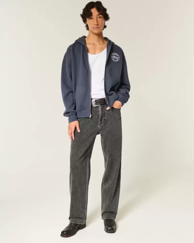 Baggy-Jeans mit verwaschenem Logo und Grafik in Schwarz