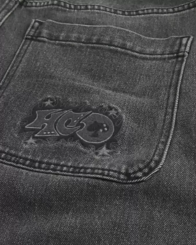Baggy-Jeans mit verwaschenem Logo und Grafik in Schwarz