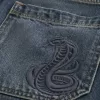 Baggy-Jeansshorts mit Schlangenmuster