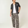 Baggy-Malerjeans im Camouflage-Design
