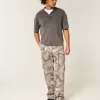 Baggy-Malerjeans mit Camouflage-Muster Baggy-Malerjeans mit Camouflage-Muster