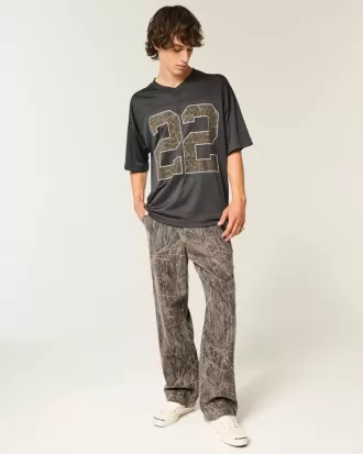 Baggy-Malerjeans mit Camouflage-Muster