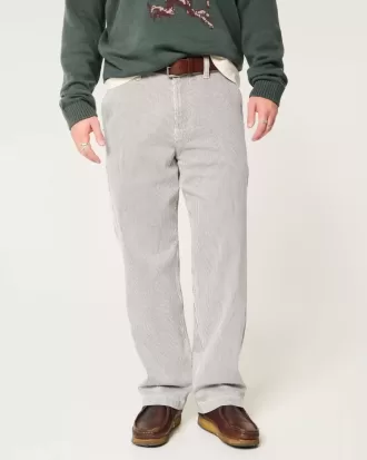 Baggy-Malerjeans mit Eisenbahnstreifen
