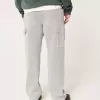 Baggy-Malerjeans mit Eisenbahnstreifen