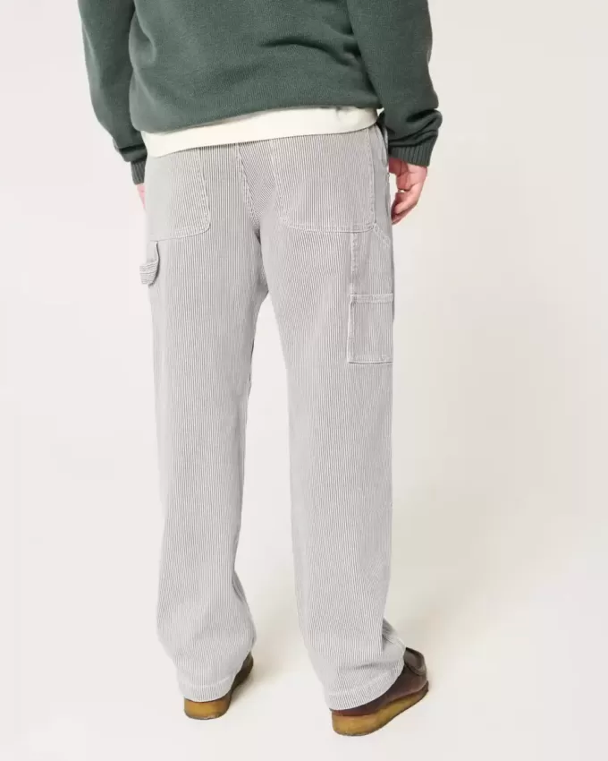 Baggy-Malerjeans mit Eisenbahnstreifen