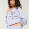 Bequemes, schulterfreies Sweatshirt mit NYC-Grafik