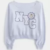 Bequemes, schulterfreies Sweatshirt mit NYC-Grafik