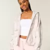 Übergroßer rosa Camouflage-Kapuzenpullover mit Reißverschluss