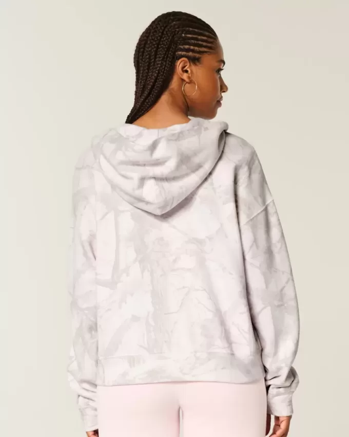 Übergroßer rosa Camouflage-Kapuzenpullover mit Reißverschluss