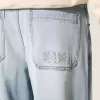 Bestickte Baggy-Skaterjeans in heller Waschung Bestickte Baggy-Skaterjeans in heller Waschung