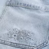 Bestickte Baggy-Skaterjeans in heller Waschung Bestickte Baggy-Skaterjeans in heller Waschung