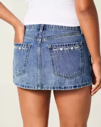 Curvy Low-Rise Mini-Jeansrock mit bestickter Schleife