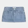 Curvy Low-Rise-Mini-Skort aus Denim in mittlerer Waschung Curvy Low-Rise-Mini-Skort aus Denim in mittlerer Waschung