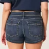 Curvy Low-Rise-Shortie-Shorts aus dunkel gewaschenem Denim Curvy Low-Rise-Shortie-Shorts aus dunkel gewaschenem Denim