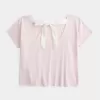 Easy Ribbon T-Shirt mit Blumengrafik und Bindeband am Rücken