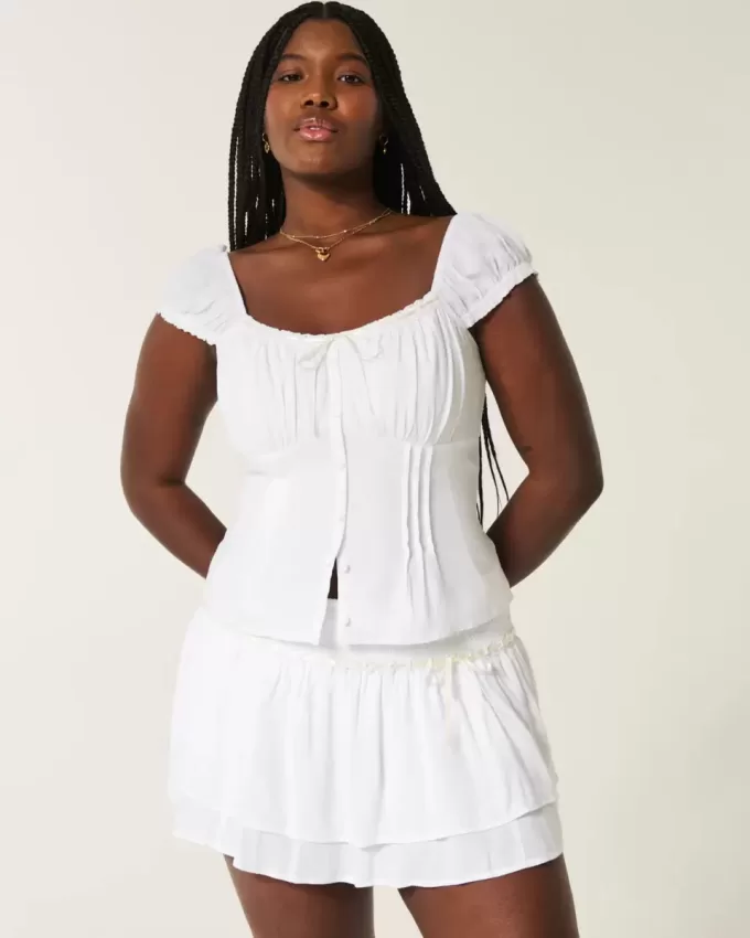 Gesmokter Mini-Skort mit Stufen Gesmokter Mini-Skort mit Stufen