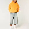 Halblange Skater-Baggy-Jeans in heller Waschung Halblange Skater-Baggy-Jeans in heller Waschung