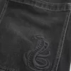 Halblange Skater-Baggy-Jeans in verwaschenem Schwarz Halblange Skater-Baggy-Jeans in verwaschenem Schwarz