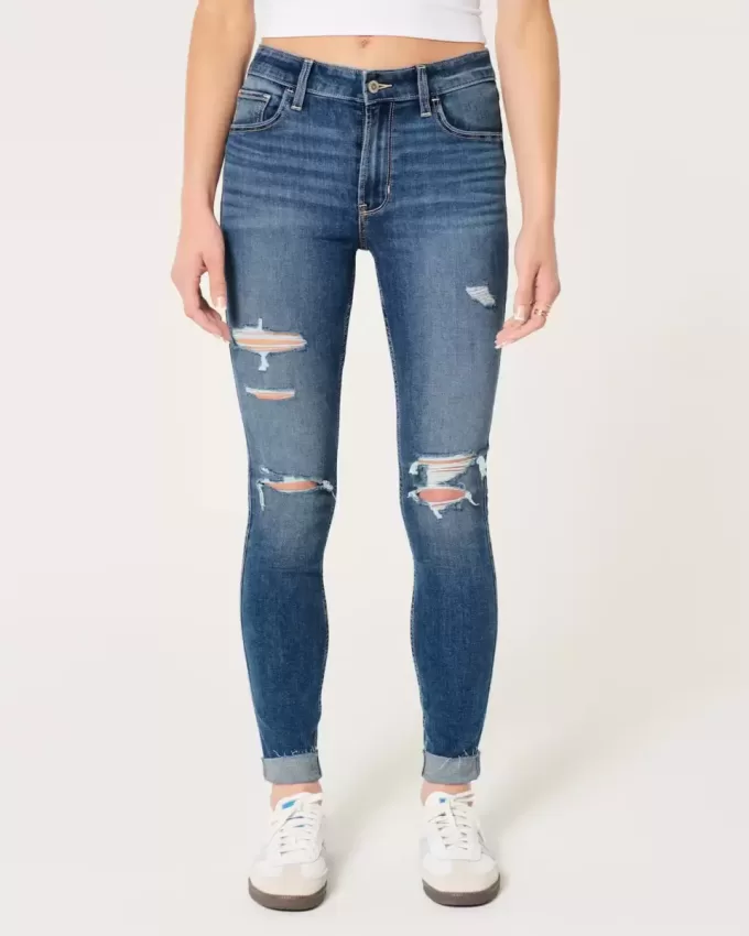 High-Rise-Risse, zerrissene Super Skinny Jeans in mittlerer Waschung High-Rise-Risse, zerrissene Super Skinny Jeans in mittlerer Waschung