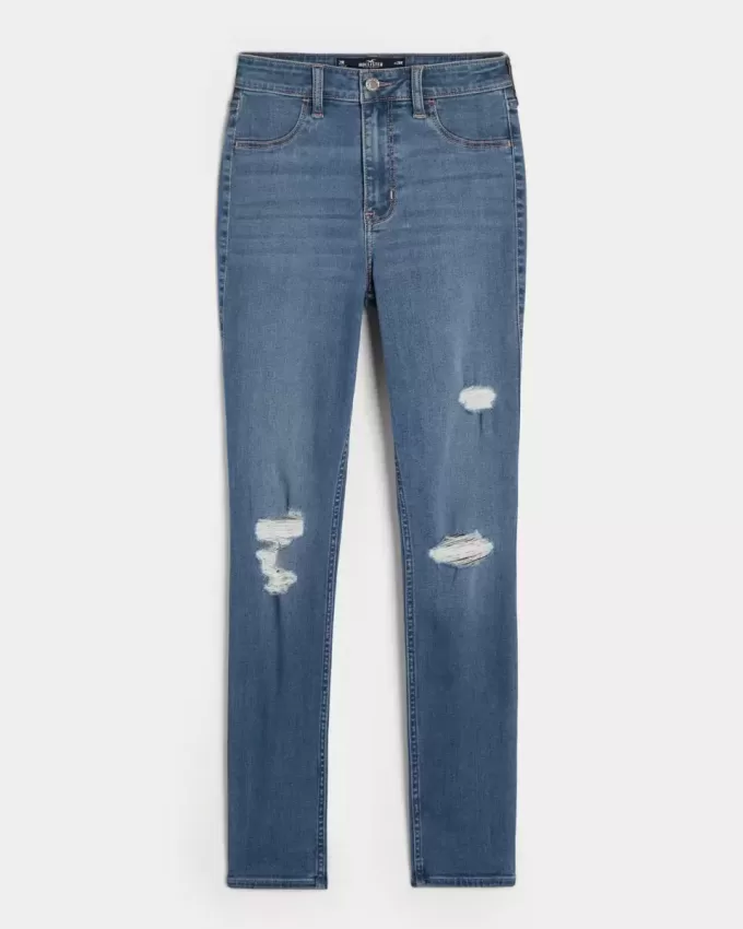 Hoch geschnittene Jeans-Leggings mit Rissen in mittlerer Waschung Hoch geschnittene Jeans-Leggings mit Rissen in mittlerer Waschung