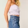 Hoch geschnittene Jeansshorts in A-Linie mit mittlerer Waschung und Blumenstickerei Hoch geschnittene Jeansshorts in A-Linie mit mittlerer Waschung und Blumenstickerei