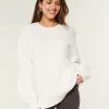 Hollister – Bequemer Cloud-Pullover mit Rundhalsausschnitt und Zopfmuster Hollister – Bequemer Cloud-Pullover mit Rundhalsausschnitt und Zopfmuster