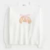 Hollister – Bequemer Pullover mit Rundhalsausschnitt und Cloud-Croissant-Grafik Hollister – Bequemer Pullover mit Rundhalsausschnitt und Cloud-Croissant-Grafik