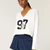 Hollister – Bequemer Pullover mit Wolkengrafik und Kerbkragen Hollister – Bequemer Pullover mit Wolkengrafik und Kerbkragen