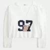 Hollister – Bequemer Pullover mit Wolkengrafik und Kerbkragen Hollister – Bequemer Pullover mit Wolkengrafik und Kerbkragen
