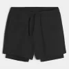 Hybrid-Aktivshorts bis zur Mitte des Oberschenkels