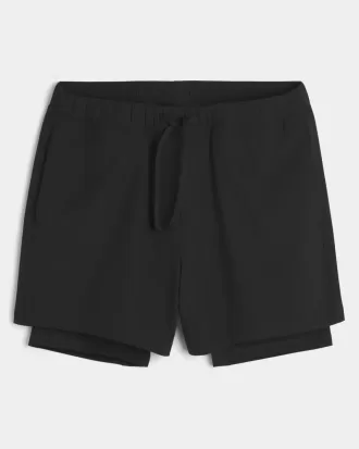 Hybrid-Aktivshorts bis zur Mitte des Oberschenkels